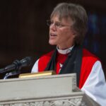 Photograph of Bishop Mariann Buddy at the pulpit.