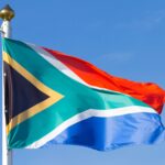 The Priest & the Prof Photograph of the South African flag.
